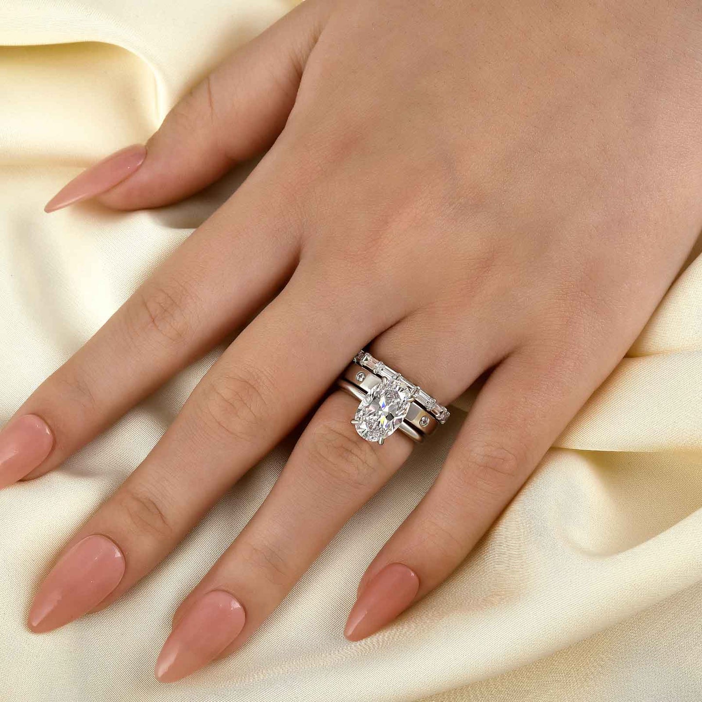 3.5Ct Oval Diamond Ring with 2.5Ct Mixed Cut Band