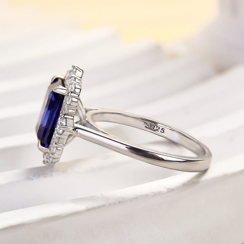 3.0ct Emerald Cut Blue Sapphire Halo Ring