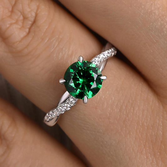 1.25 Carat Round Emerald Green Twist Ring