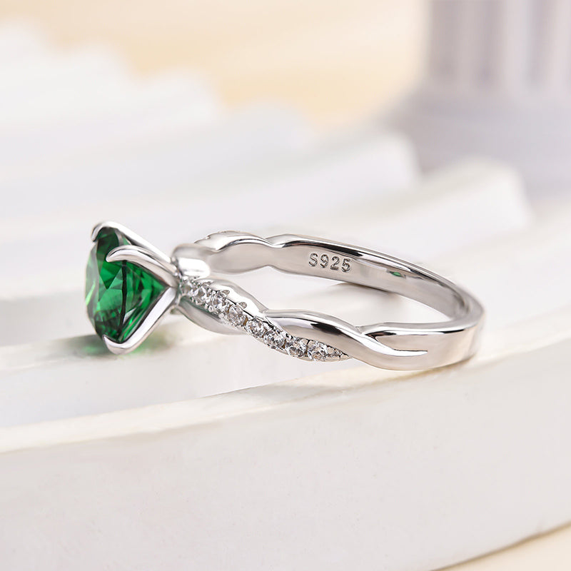 1.25 Carat Round Emerald Green Twist Ring