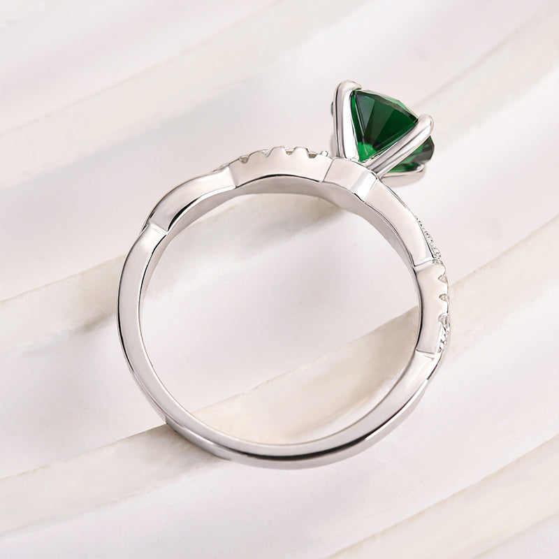 1.25 Carat Round Emerald Green Twist Ring