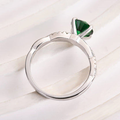 1.25 Carat Round Emerald Green Twist Ring