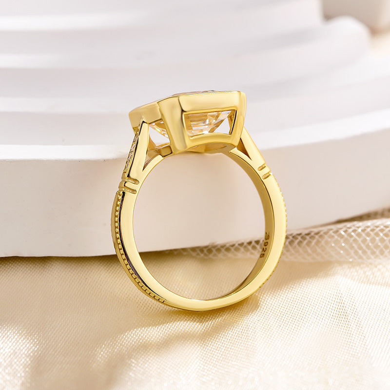 4.5 Carat Emerald Cut Bezel Set Diamond Ring