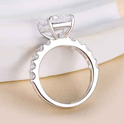Sterling Silver Cushion Cut Sona Diamond Ring with Round Side Stones