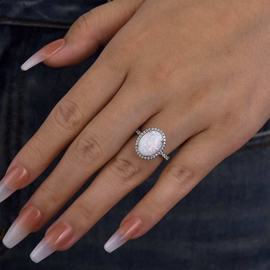 4.25 Carat Oval Opal Diamond Accent Ring