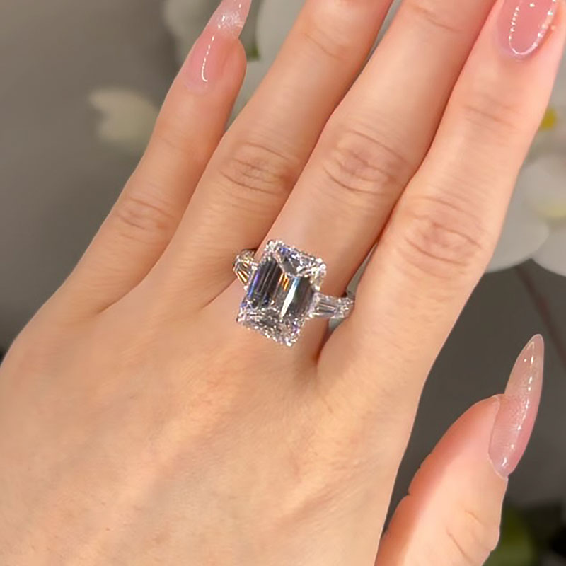 7.5 Carat Emerald Cut Three Stone Diamond Ring