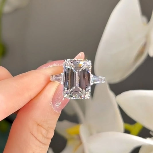 7.5 Carat Emerald Cut Three Stone Diamond Ring