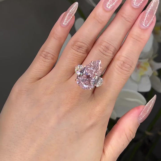 8 Carat Pear Cut Pink Sapphire Three Stone Ring