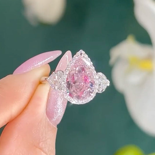 4 Carat Pear Cut Pink Sapphire Three Stone Ring