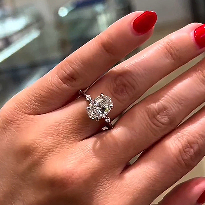 4Ct Oval Cut Diamond Ring with 0.5Ct Side Stones 925 Silver