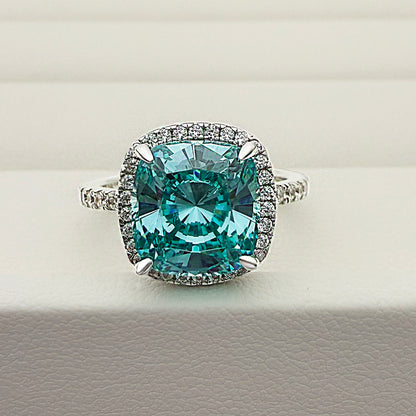 Luxurious Halo Cushion Cut 5 Carat Cyan Blue Stone Engagement Ring In Sterling Silver item no. HT021A12