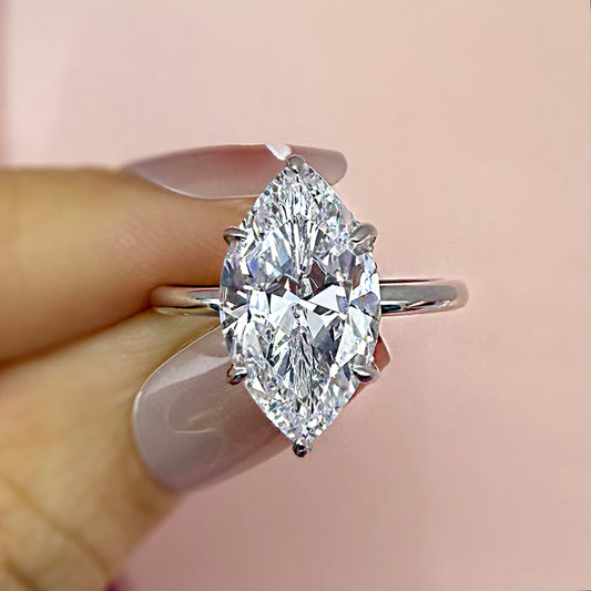 Unique Marquise Cut 3.5 Carat Zircon Engagement Ring In Sterling Silver Item no. HT080