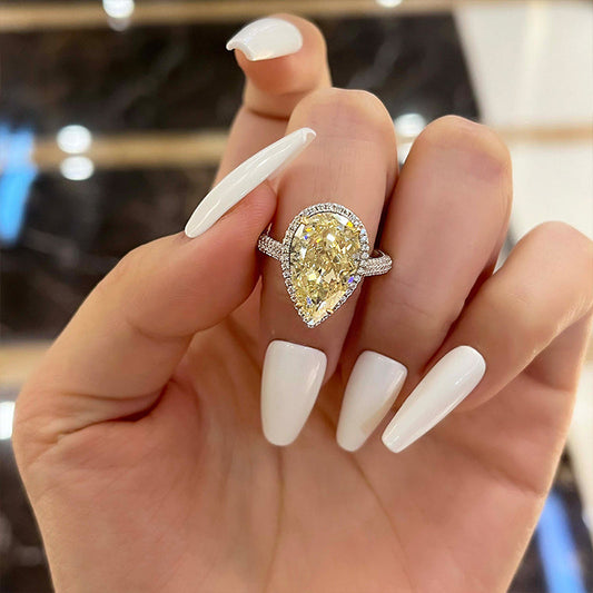 4.5 Carat Pear Cut Yellow Sapphire Halo Ring