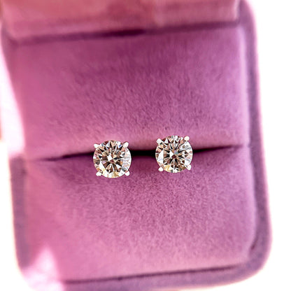 Round Moissanite Earrings in Rhodium-Plated Sterling Silver