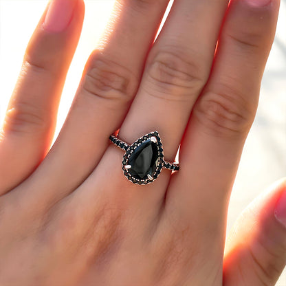 2.5 Carat Pear Cut Black Diamond Halo Ring